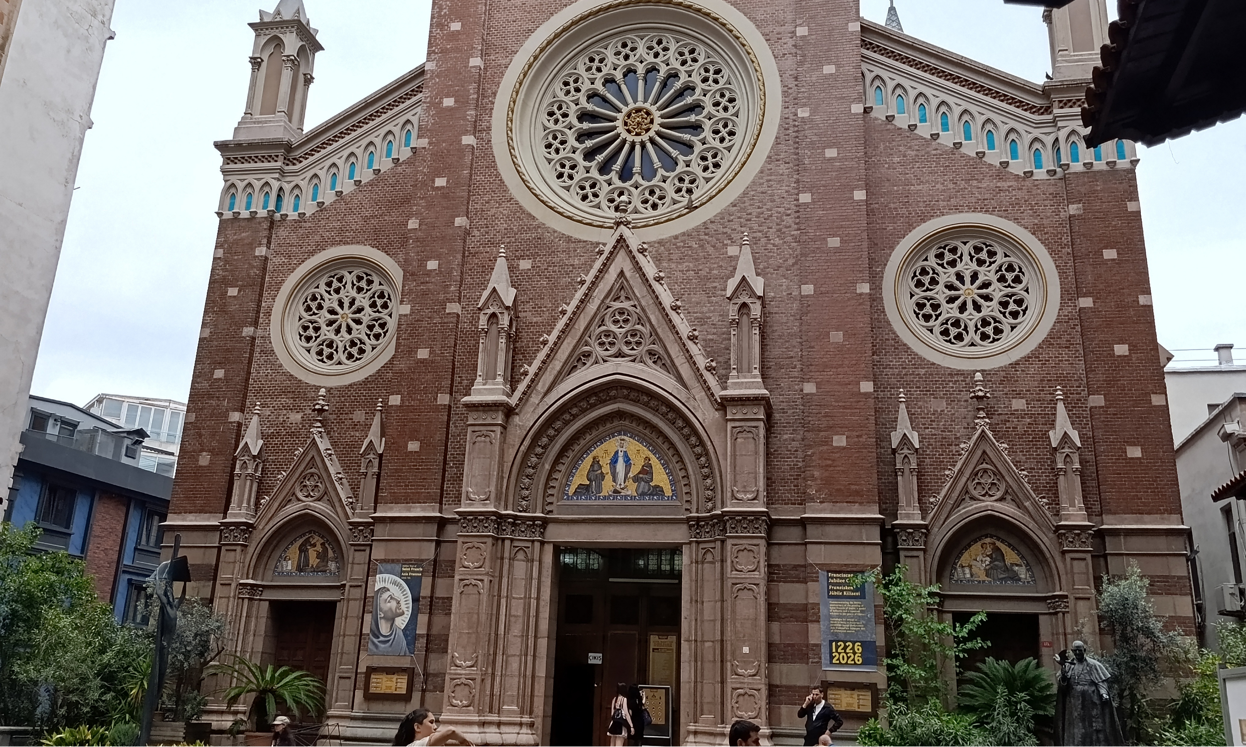 Red brick facade of St. Antoine Church on Istiklal Caddesi, Istanbul