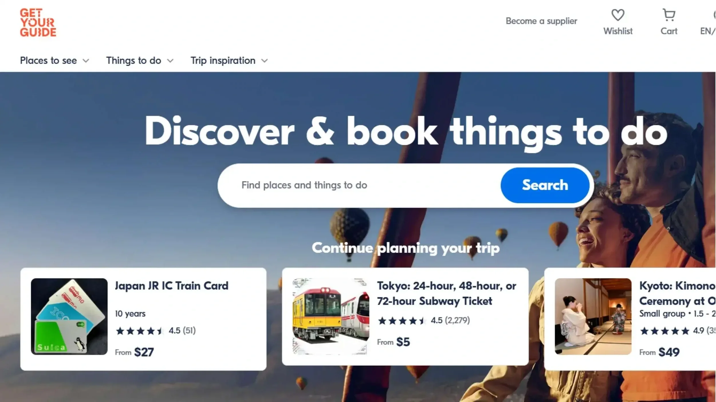 Traveler browsing online travel agencies like GetYourGuide to book a trip online.