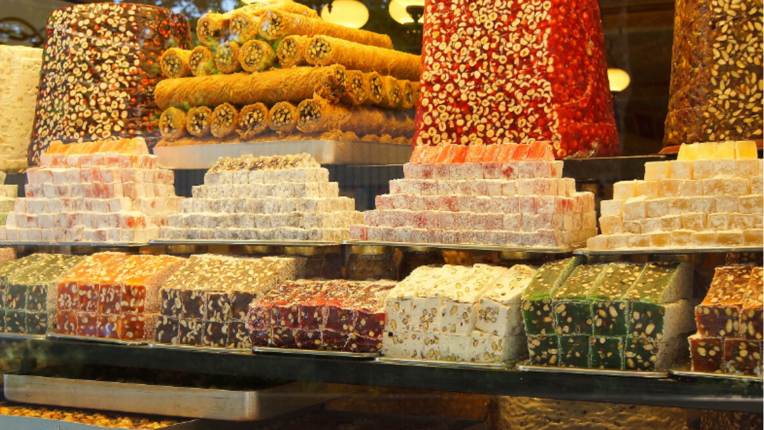 Colorful Turkish delight sweets flavored with pistachio and rose — a traditional treat in Turkey.
