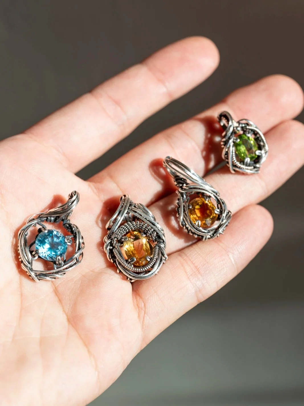 Pendants
Blue Topaz / Citrine / Citrine / peridot 

///
- Fine Silver
- Sterling Silver
- Oxidized &amp; Polished

///
W.A.S
Wrap Around Studio
Wire Wrapped Jewellery 

#wraparoundstudio
#wasjewels 
#迴繞製物