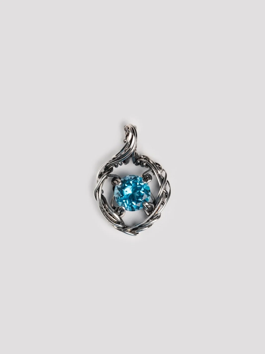 Blue Topaz Pendant

///
- Fine Silver
- Sterling Silver
- Oxidized &amp; Polished

///
W.A.S
Wrap Around Studio
Wire Wrapped Jewellery 

#wraparoundstudio
#wasjewels 
#迴繞製物