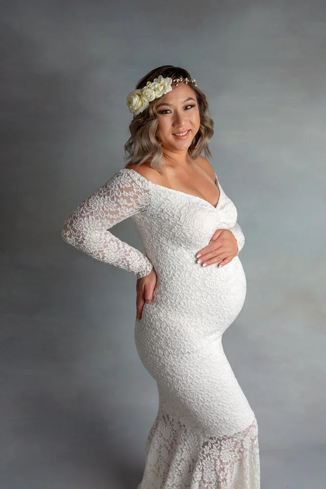 Goddess Mama 
 Color:  White  Size:  Average  Coverage:  Full Coverage 

This gown has long sleeves and an all-lacy body and train. Nude panties and strapless work best for this dress.