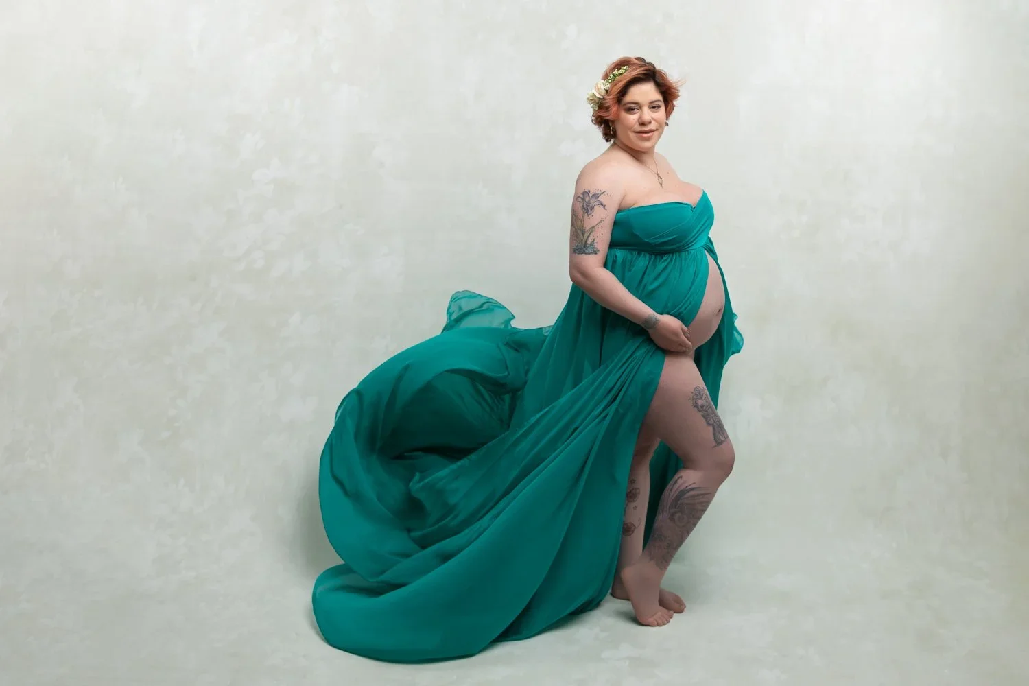 Jade Queen Mama 
 Color:  Jade  Size:  Petite  Coverage:  Full Coverage 

This gown is strapless and has a see-through extra long skirt. It has an opening from the belly down. Nude panties and strapless work best for this dress.