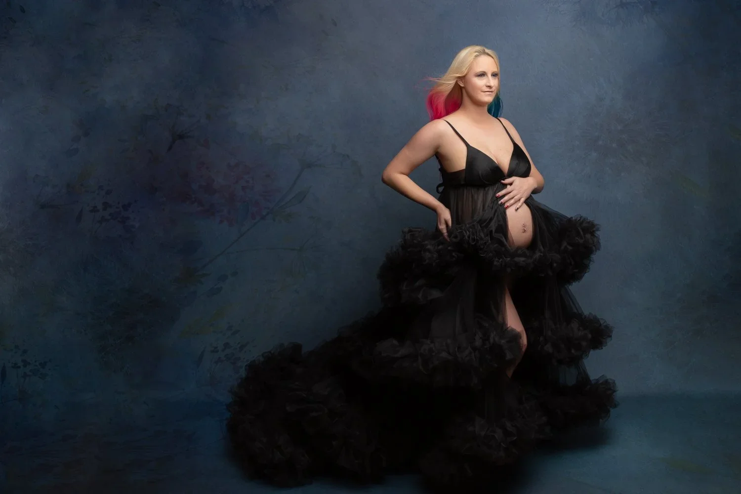 Night Queen Mama 
 Color:  Black  Size:  Average  Coverage:  Partial Coverage 

This gown has a long, ruffled skirt. It is open in the front to allow for exposed belly. Can be worn with long ruffled sleeves or without. Nude or black panties and strap