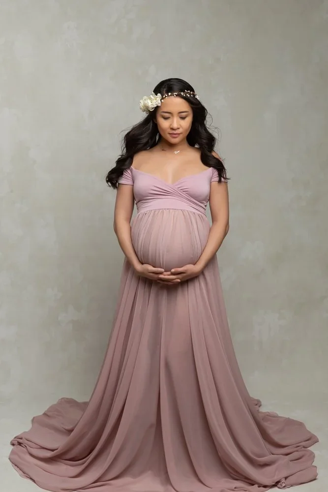 Delicate Mama 
 Color:  Dusty Pink  Size:  Average  Coverage:  Partial Coverage 

This gown has off the shoulder sleeves and is flowy and loose. Nude panties and strapless work best for this dress.
