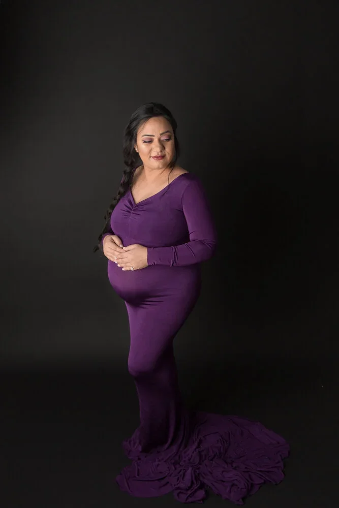 Goddess Mama 
 Color:  Eggplant  Size:  Petite  Coverage:  Full Coverage 

This gown has long sleeves and is tight all the way down. Nude or black panties and a regular bra work best for this dress.