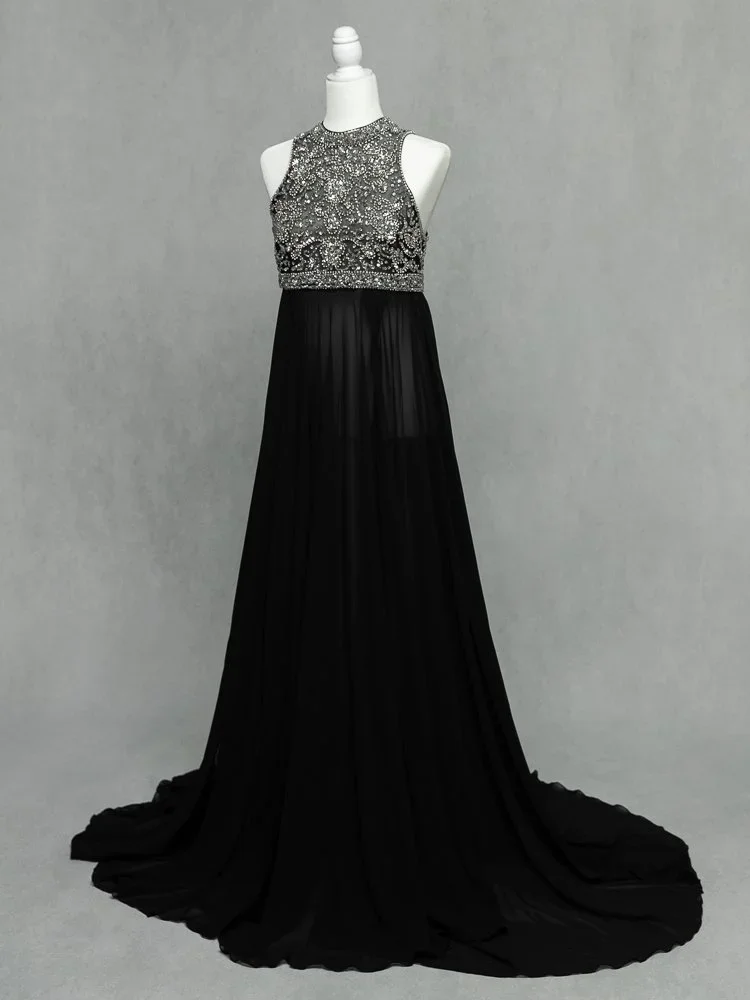Fancy Mama 
 Color:  Black  Size:  Average  Coverage:  Partial Coverage 

This gown has several openings on the bottom to allow for leg exposure. Nude panties and strapless work best for this dress.