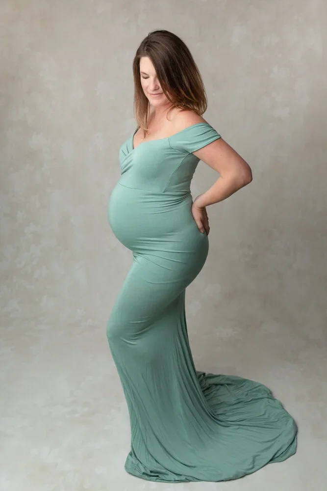 Goddess Mama 
 Color:  Sage  Size:  Average  Coverage:  Full Coverage 

This gown has short sleeves and a leg slip. Nude panties and strapless work best for this dress.