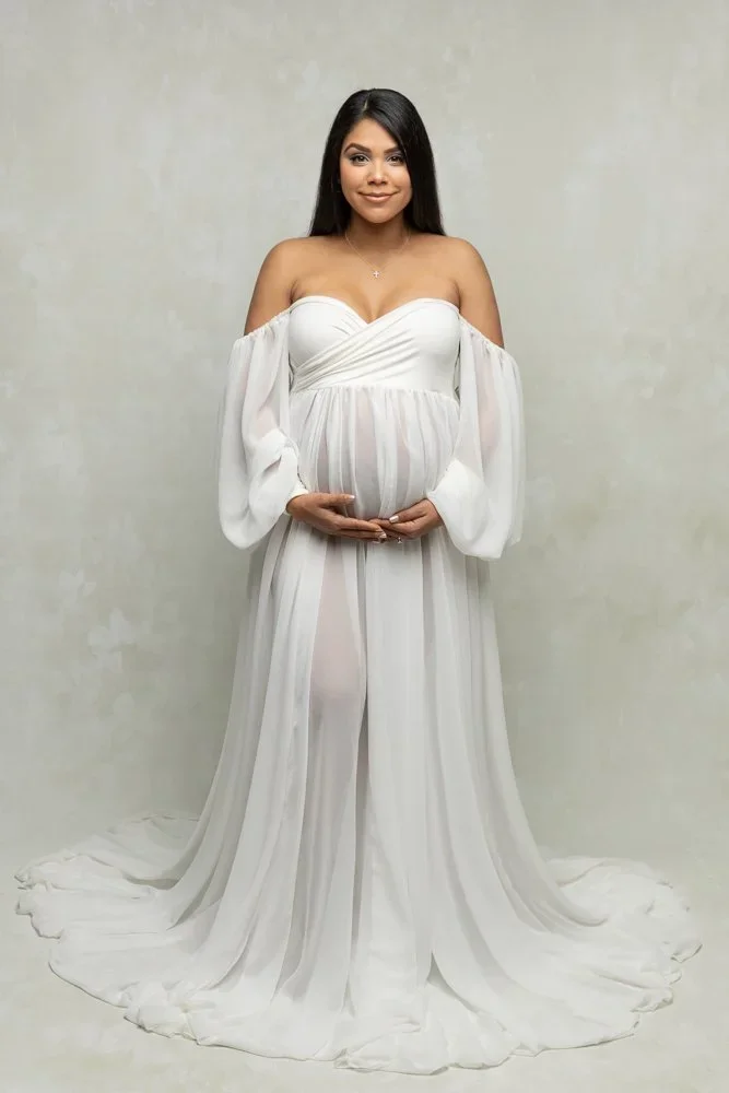 Goddess Mama 
 Color:  White  Size:  Plus  Coverage:  Partial Coverage 

This gown has off the shoulder bishop sleeves and is flowy and loose. Nude panties and strapless work best for this dress.