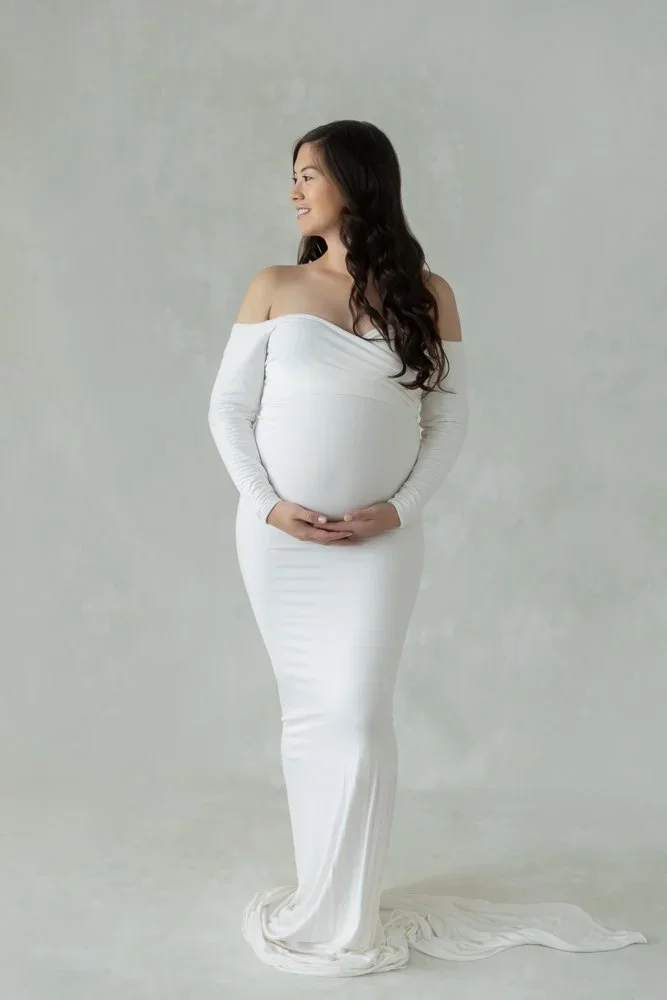 Goddess Mama 
 Color:  White  Size:  Average  Coverage:  Full Coverage 

This gown has long sleeves and fits comfortably. Nude panties and strapless work best for this dress.