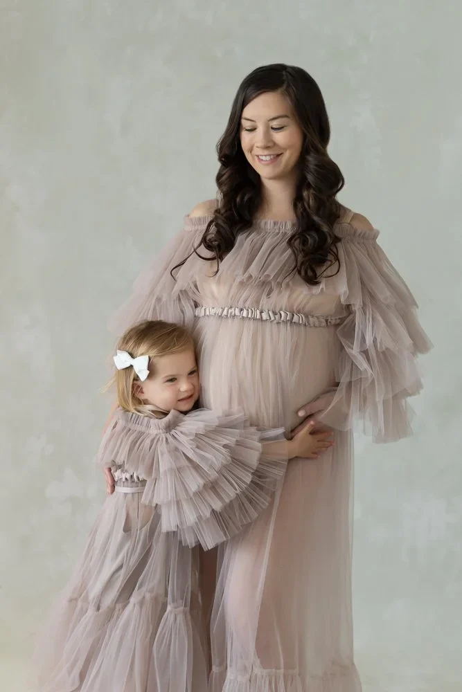 Romantic Mama 
 Color:  Soft Mauve  Size:  Petite  Coverage:  Partial Coverage 

This gown has tulle ruffly sleeves and skirt. Can be used with a nude bodysuit or lining. Nude panties and strapless work best for this dress.