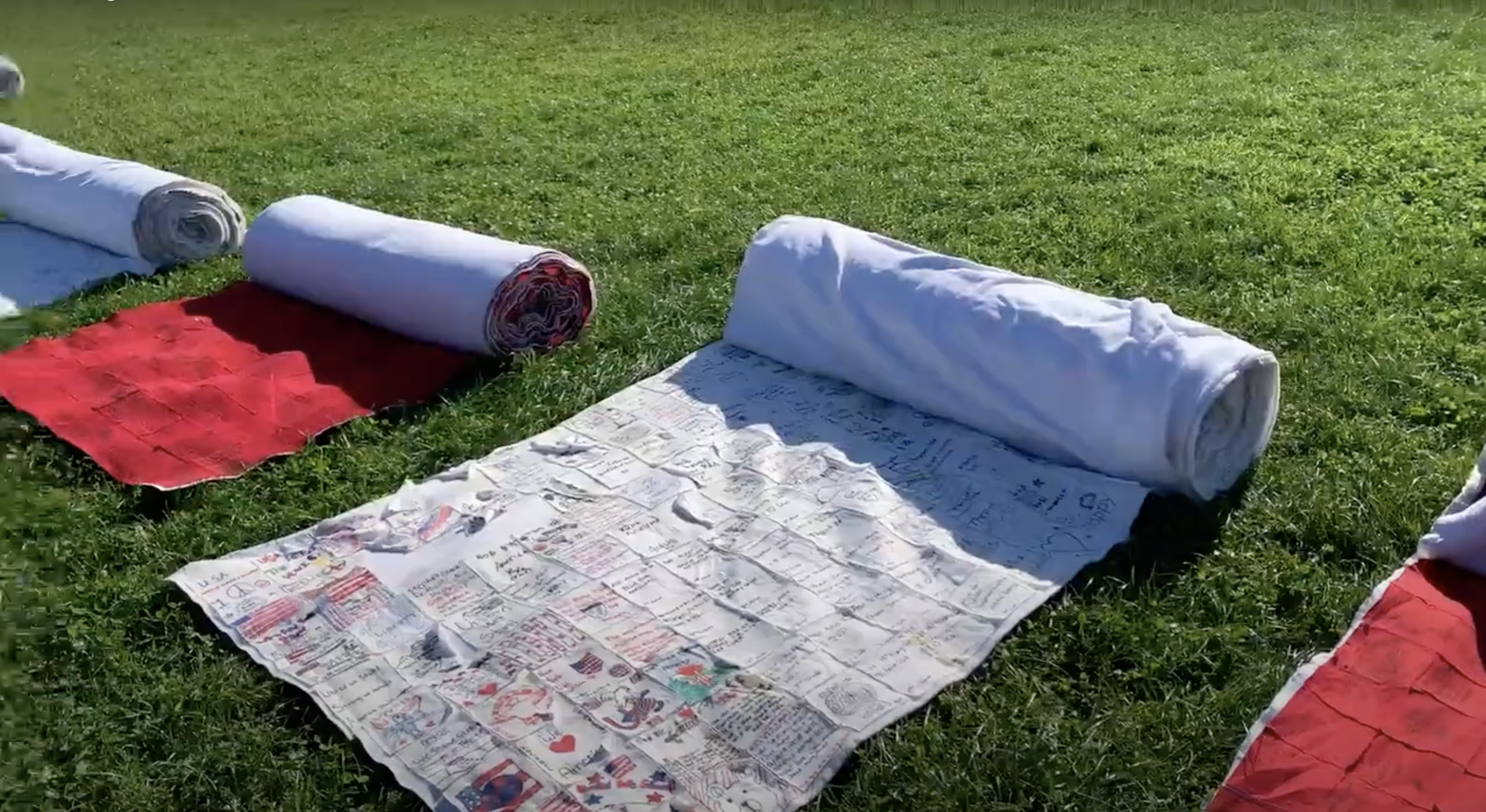 Rolls of assembled stripes for the United We Stand American Flag mosaic