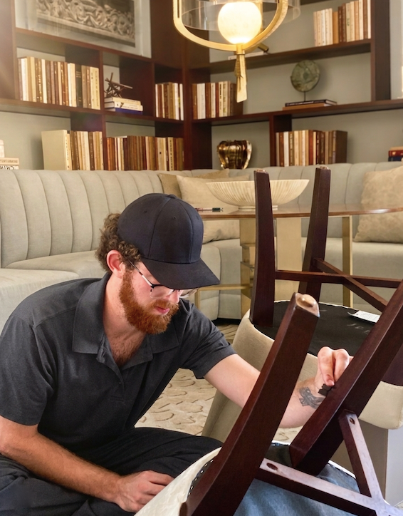 On-site wood furniture touch-up and restoration at the Mansion on Turtle Creek in Dallas. Tilia Design Co. specialists performing technical repairs with same-day room availability for guests.