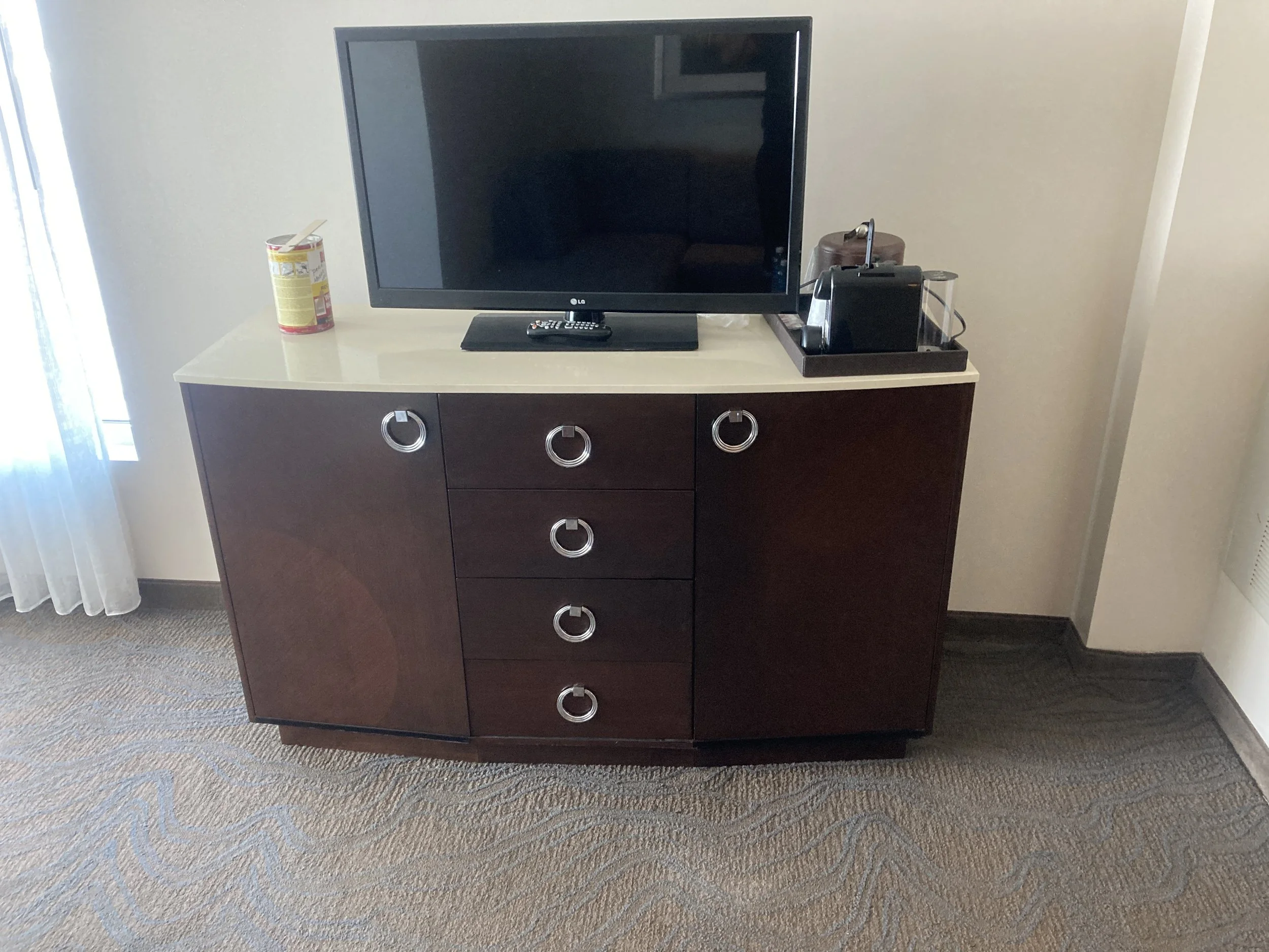 Completed 'after' results of guest suite furniture restoration at WinStar World Casino and Resort. Tilia Design Co. performed precision wood fill, color matching, and finish blending to erase severe corner damage. Our on-site process restores the hig