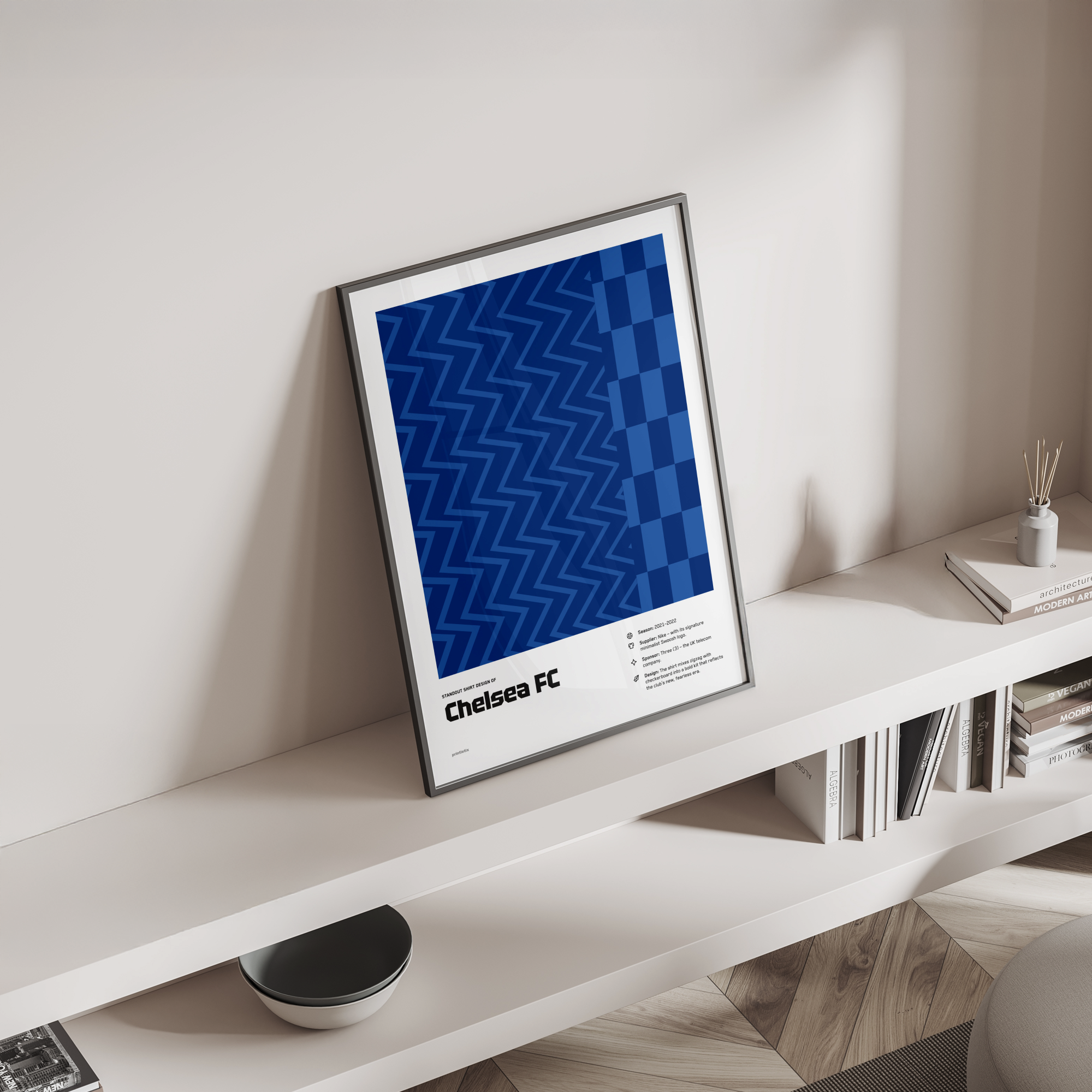 Chelsea’s “Zig-Zag” shirt poster standing on a shelf