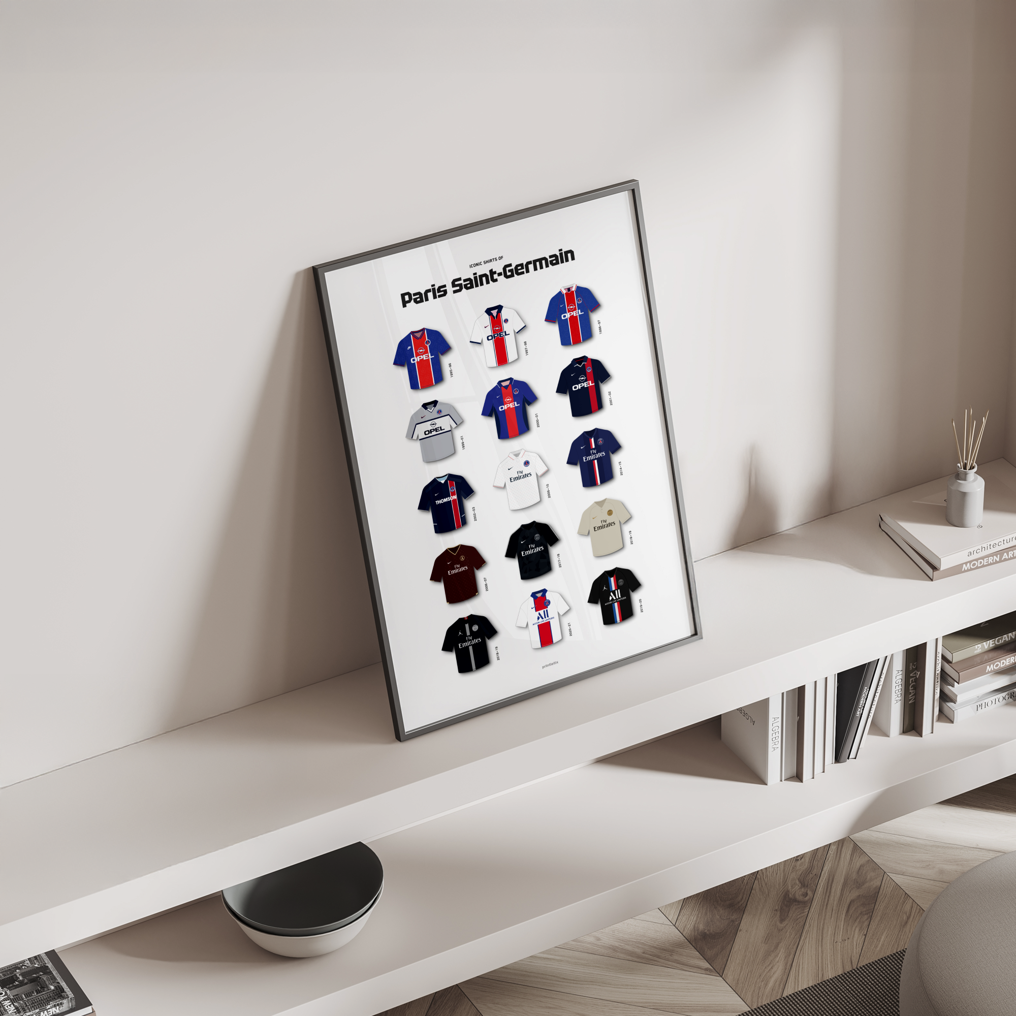 Les Parisiens iconic kits poster standing on a shelf