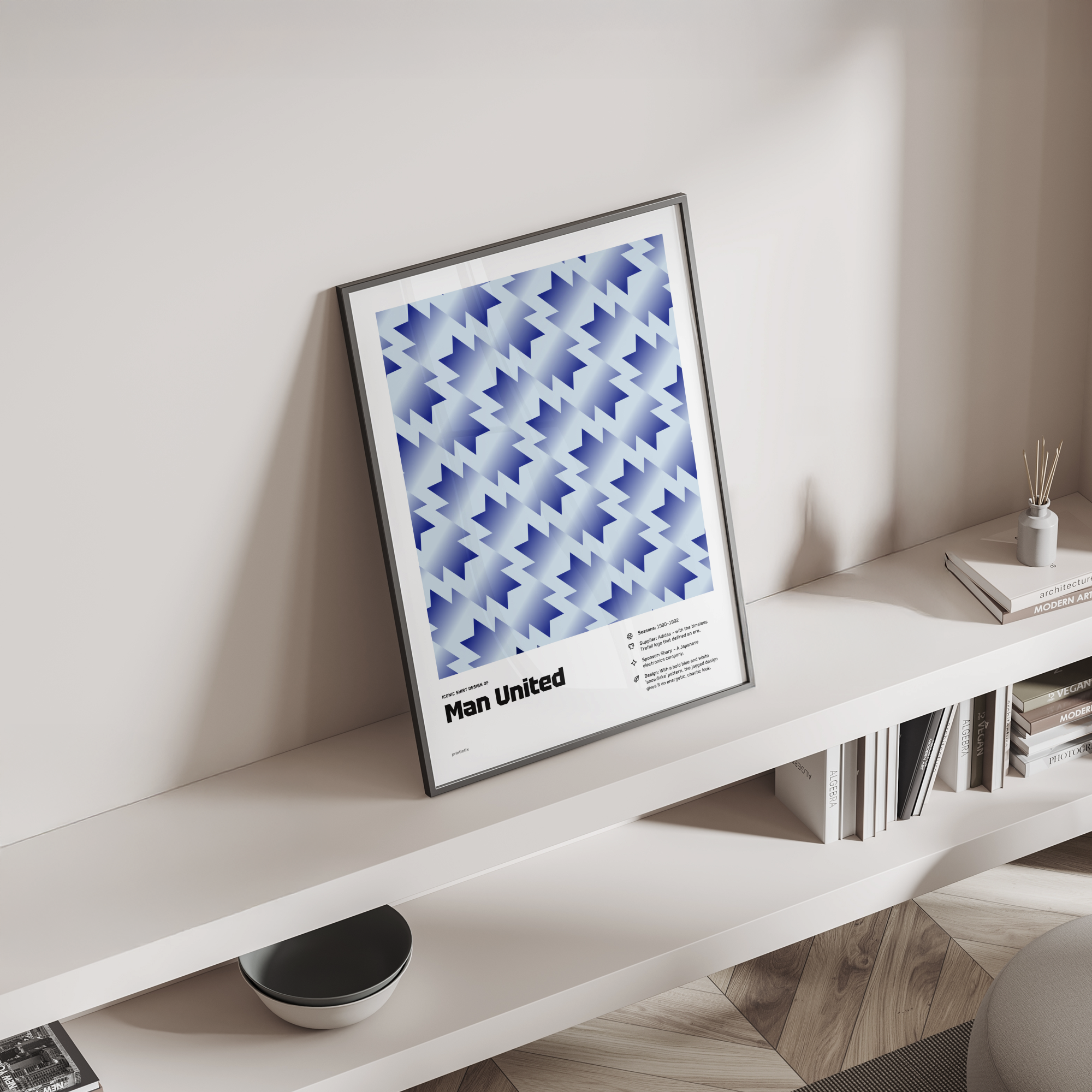 Man United “Snowflake” shirt poster standing on a shelf