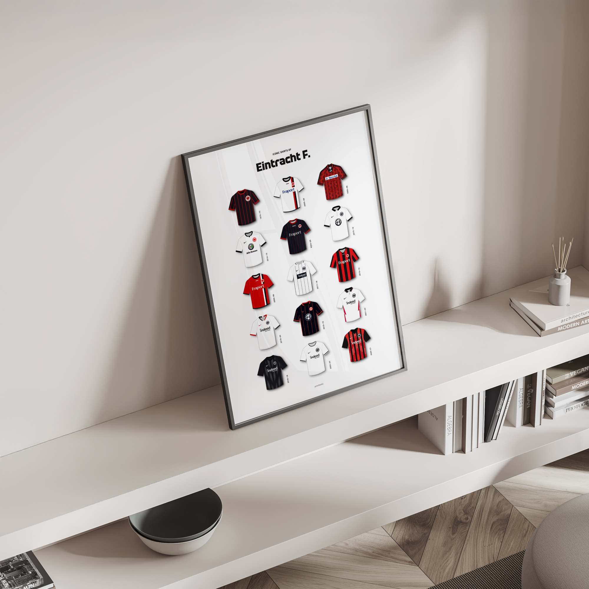 Die Adler iconic kits poster standing on a shelf