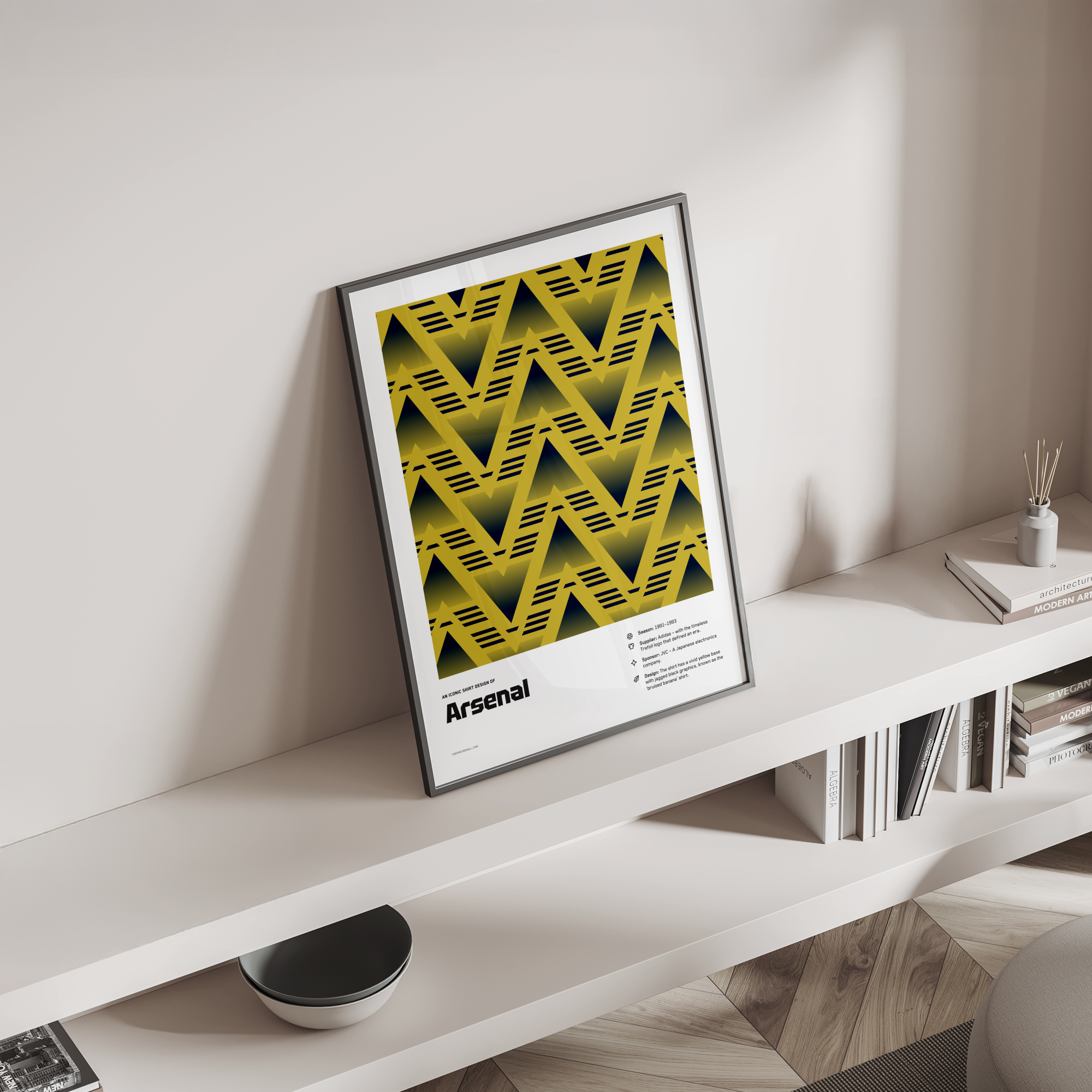 Arsenal’s “Bruised banana” shirt poster standing on a shelf