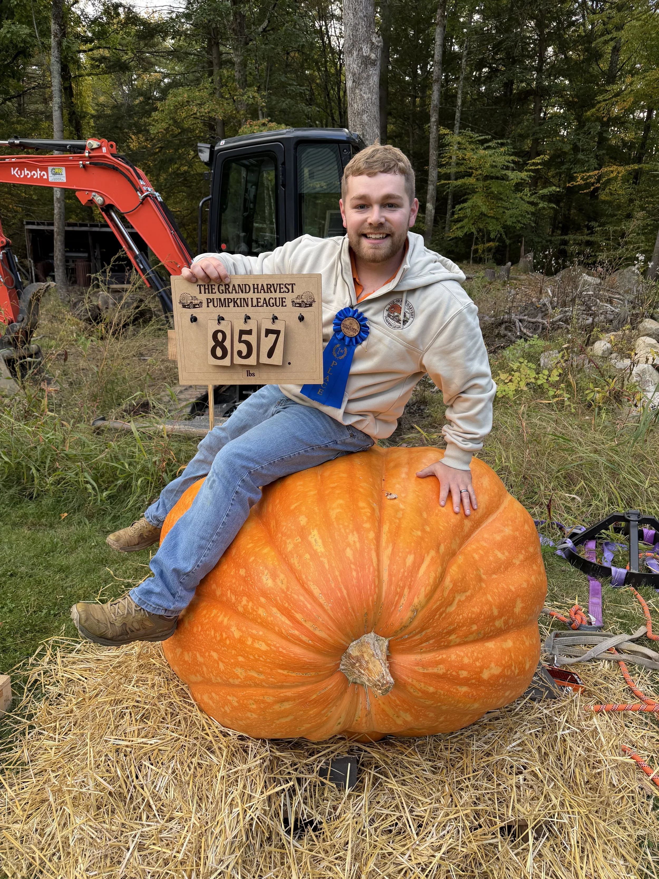 1st Place Giant Pumpkin Competition - Zac with his 857-lb giant 