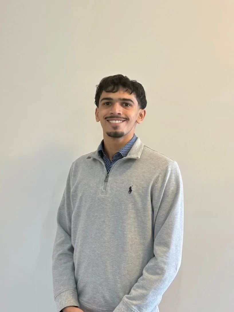 An image of a male Intellectual property Ontario employee on grey shirt