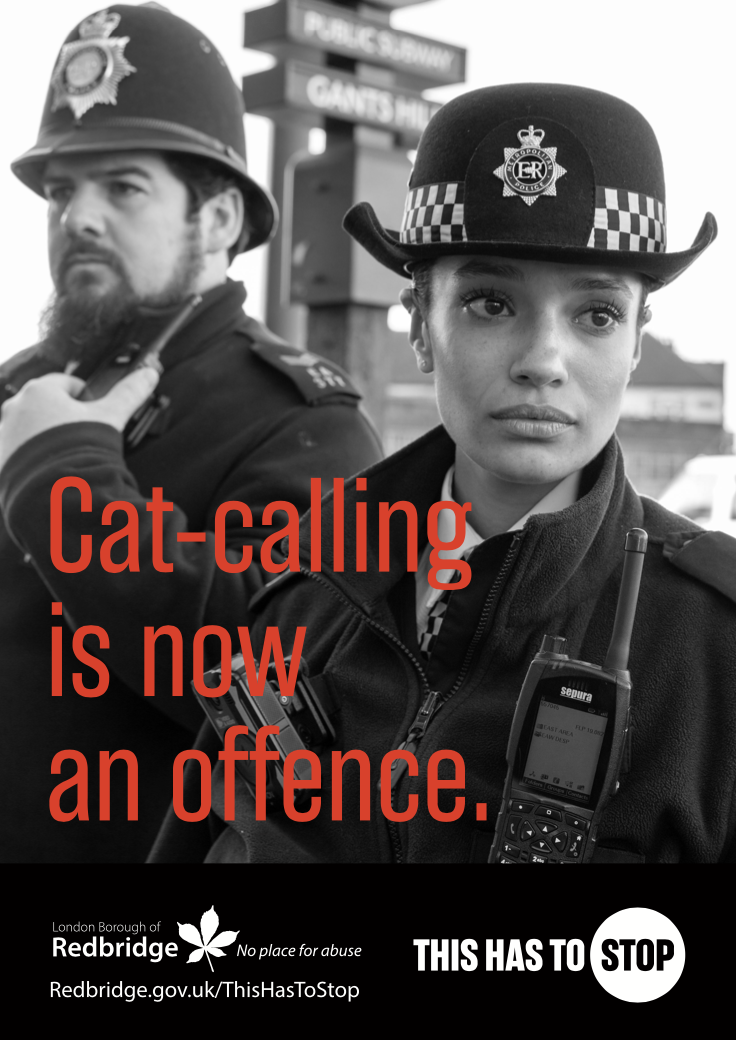 A picture of a poster of two police officers in Redbridge with the caption 'Cat-calling is now an offence'.