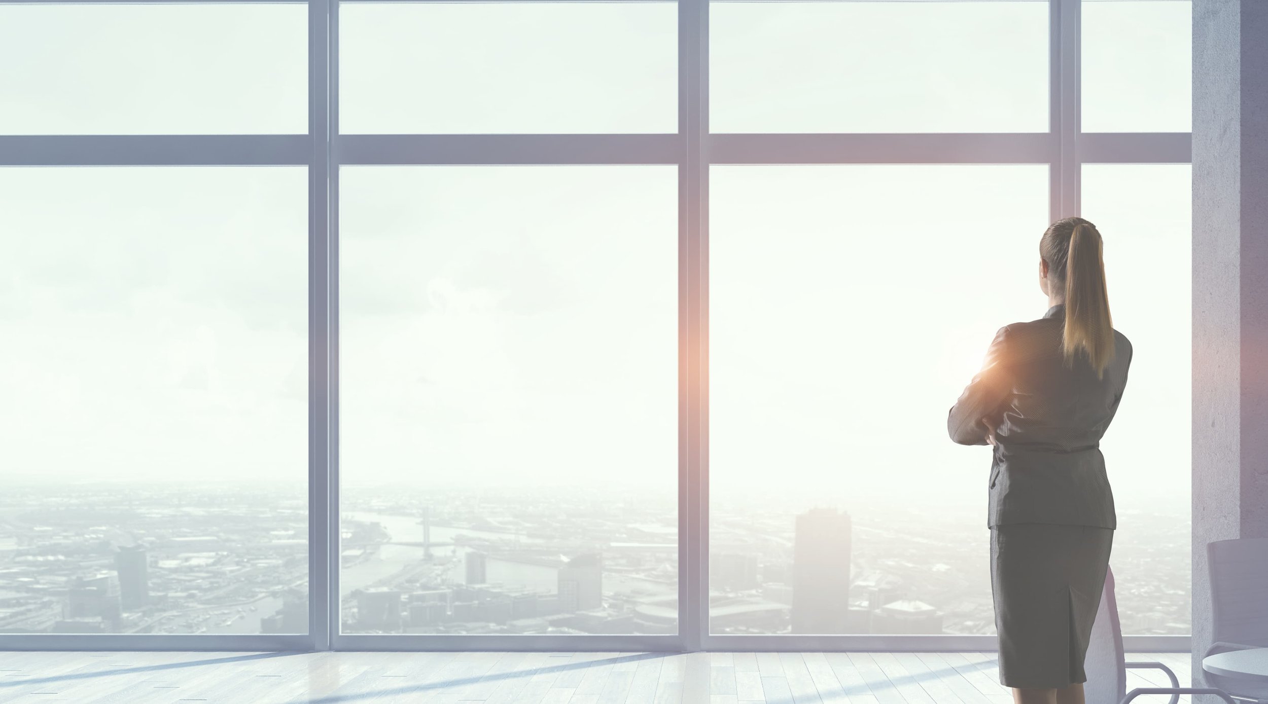 woman looking out window