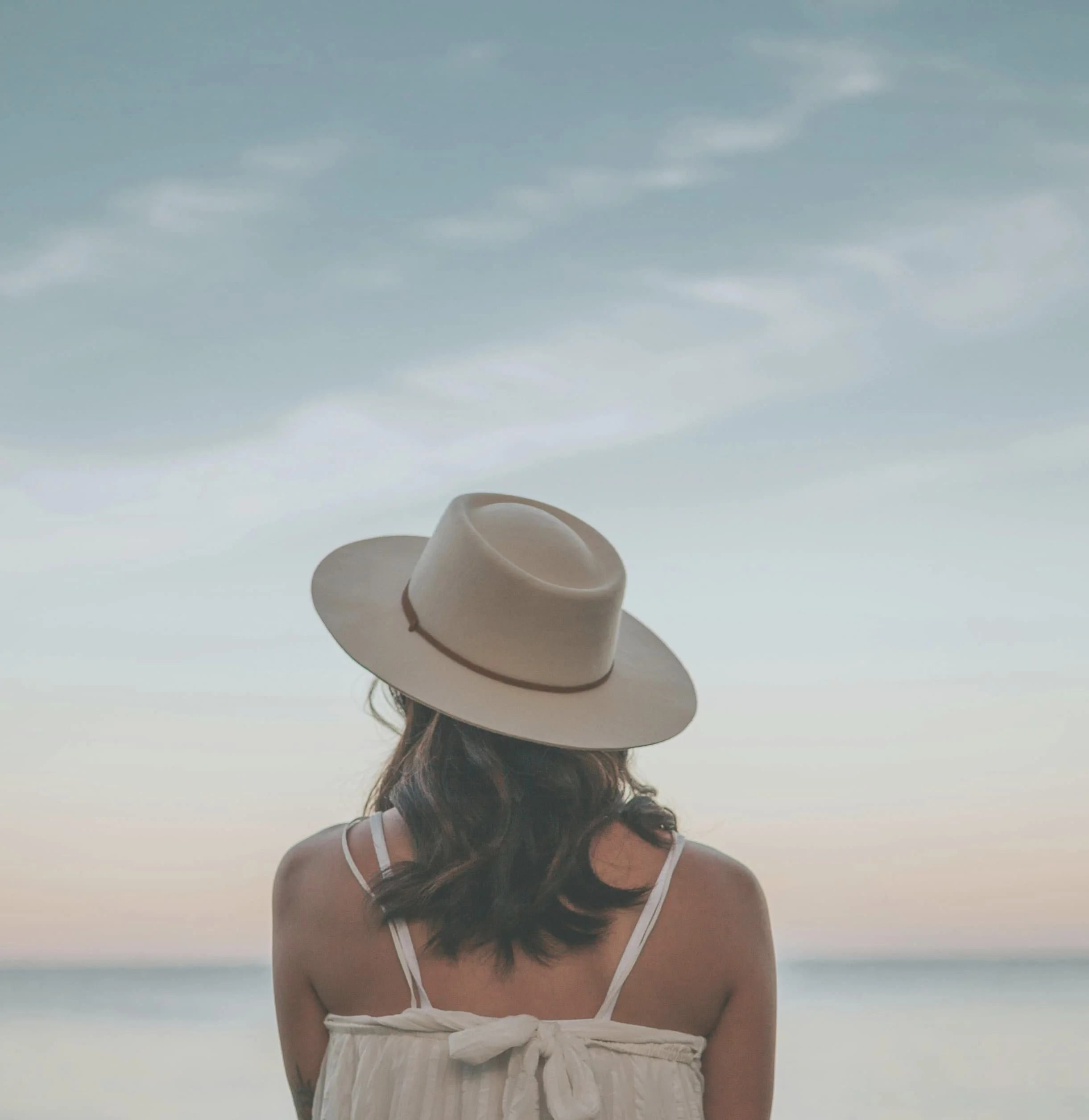 woman looking out over water