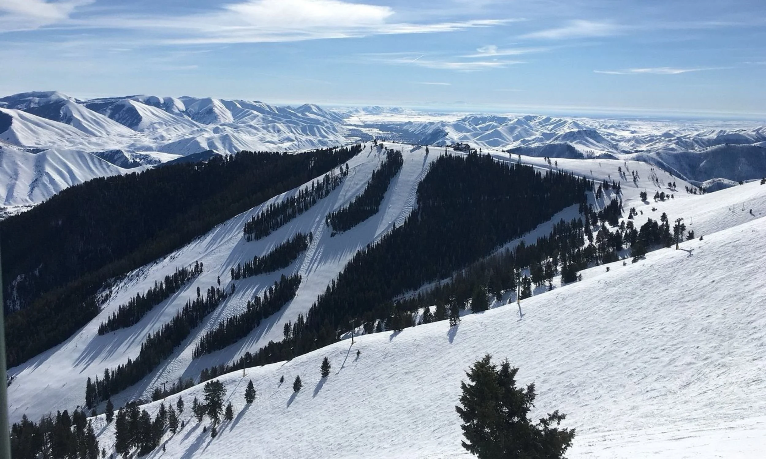 women in finance ski retreat hero image snowy ski mountain