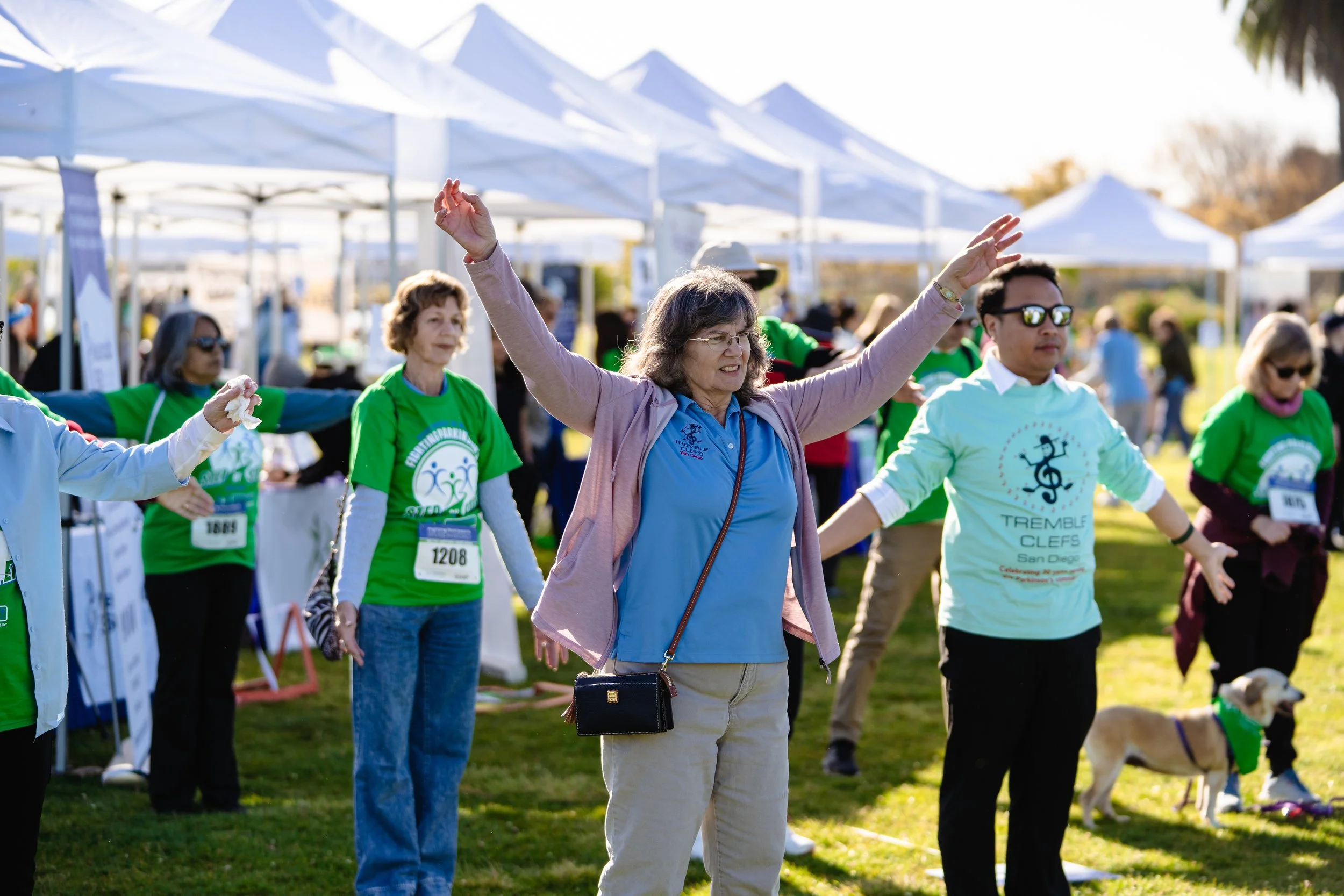 A member participating in a physical warm up