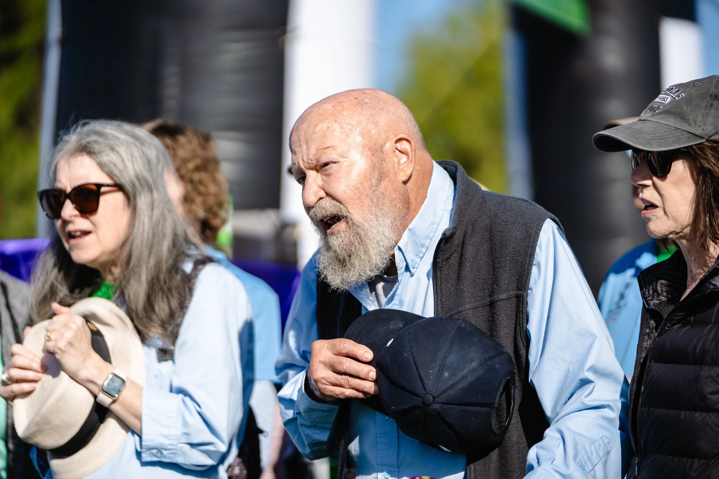 People singing the National Anthem