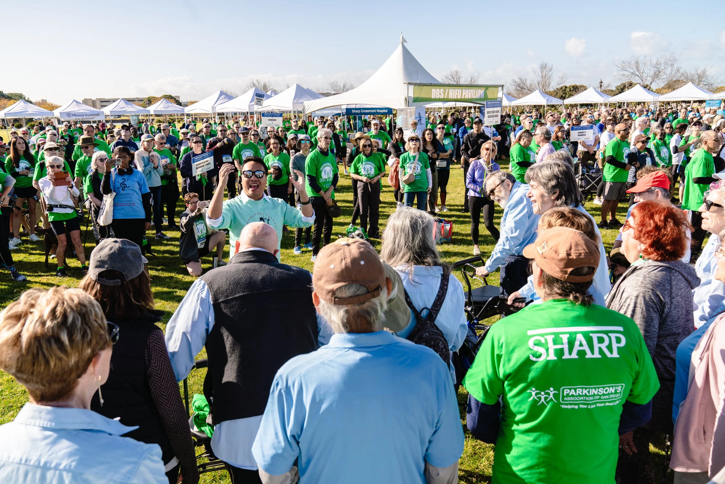 Musical director singing with members