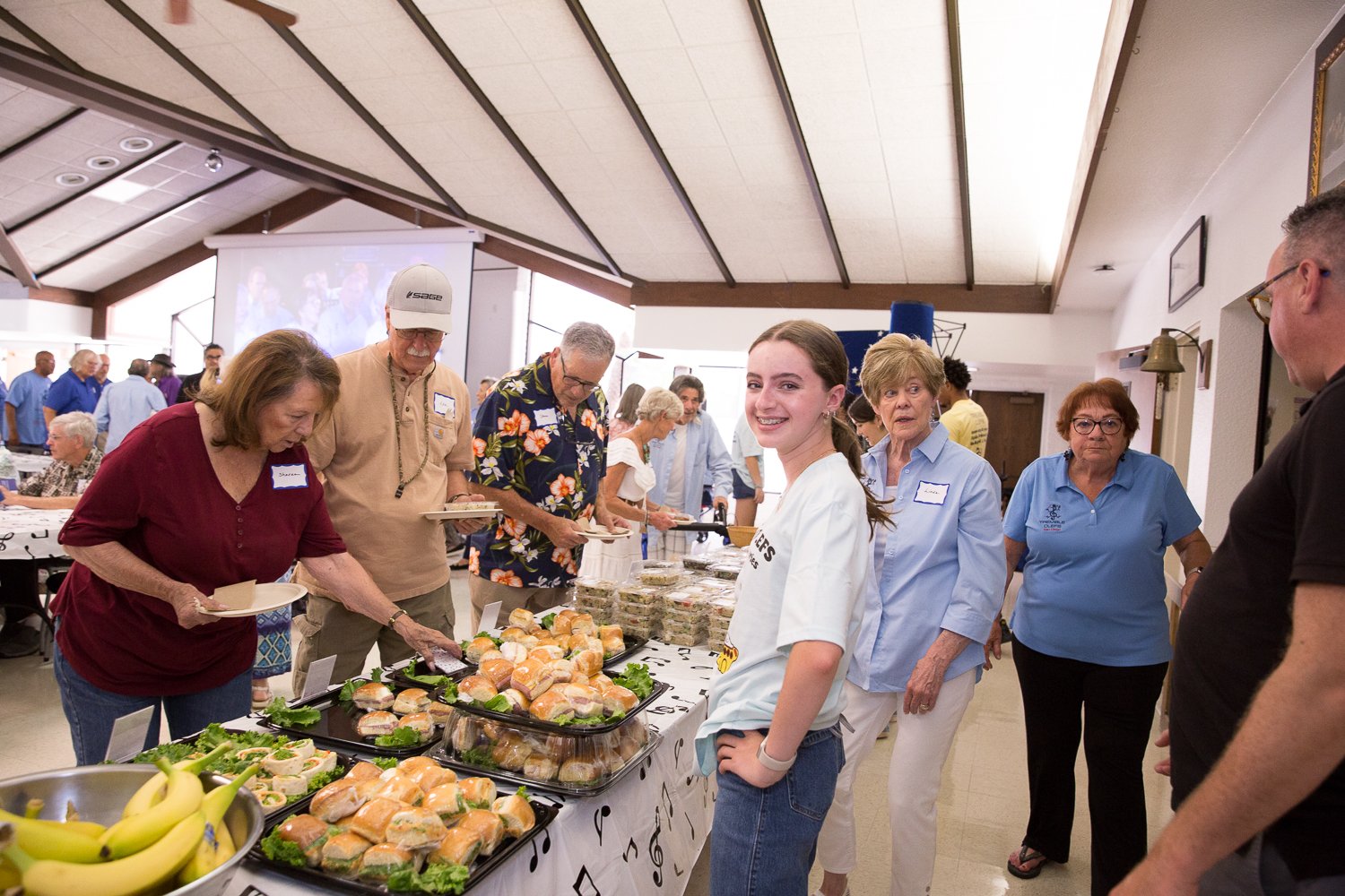 A Junior Clefs volunteer helping at an event