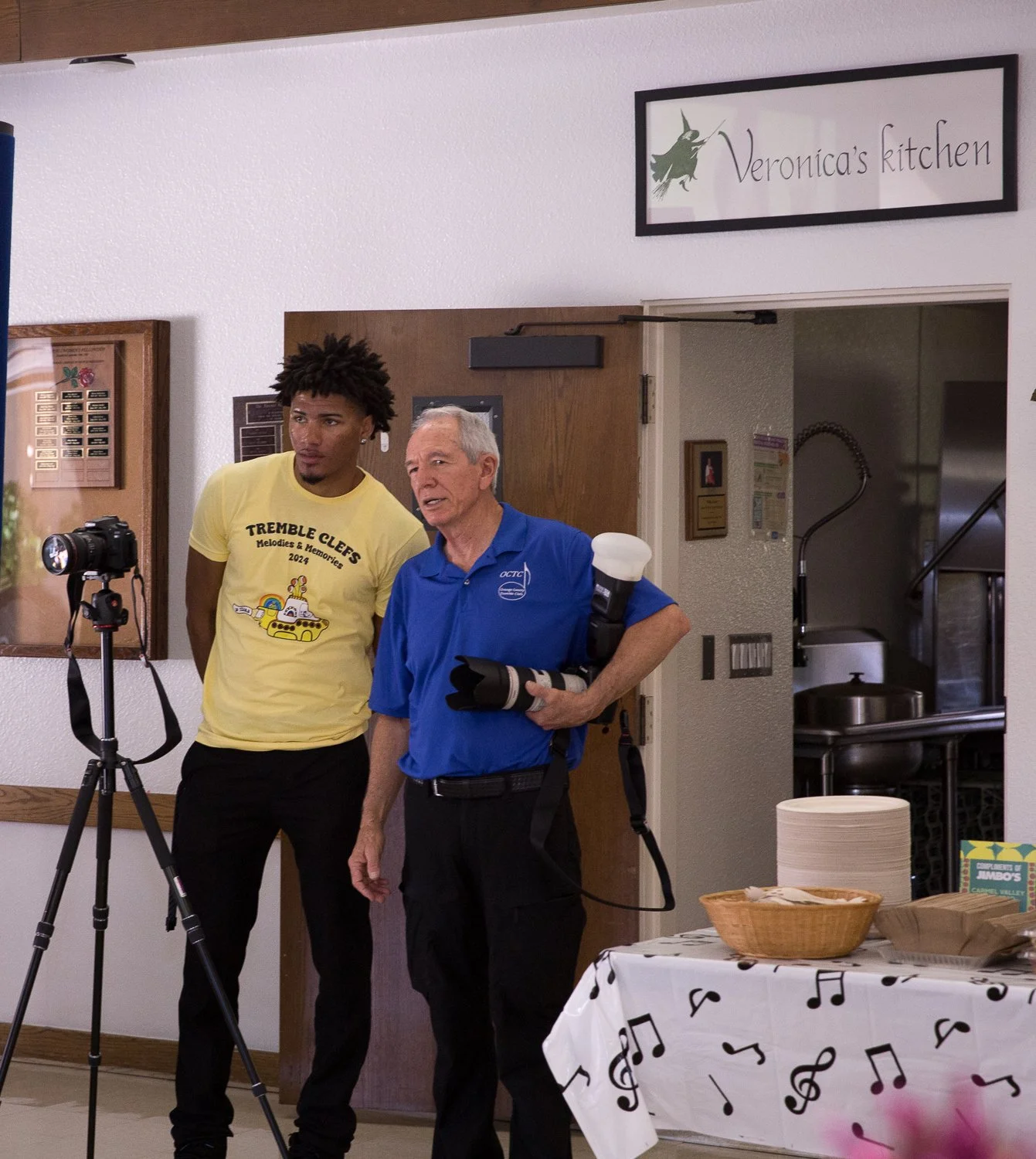 A Junior Clefs volunteer helping with audio visual work
