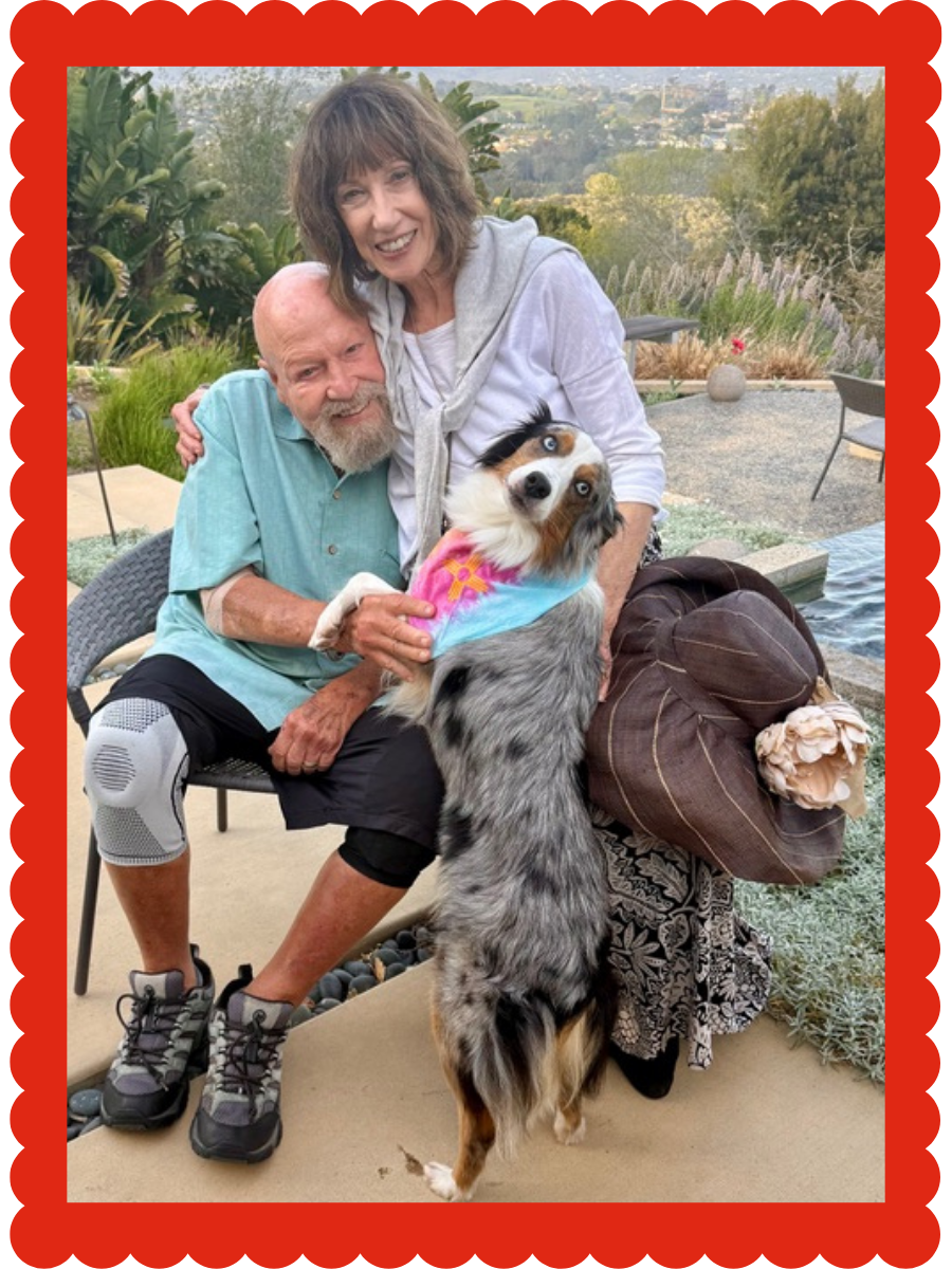 Framed photo of a woman, her partner with Parkinsons, and her dog