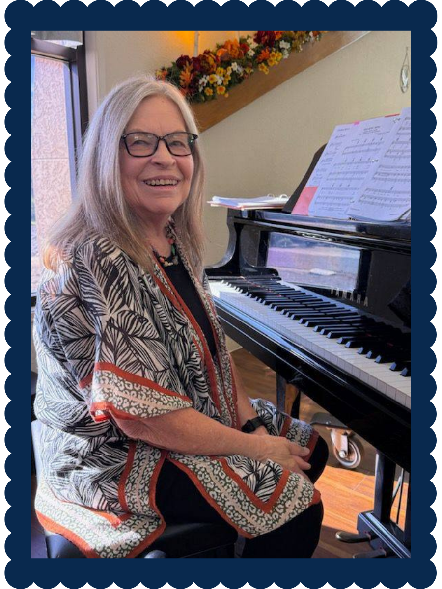 Framed photo of Gina Seashore on the piano