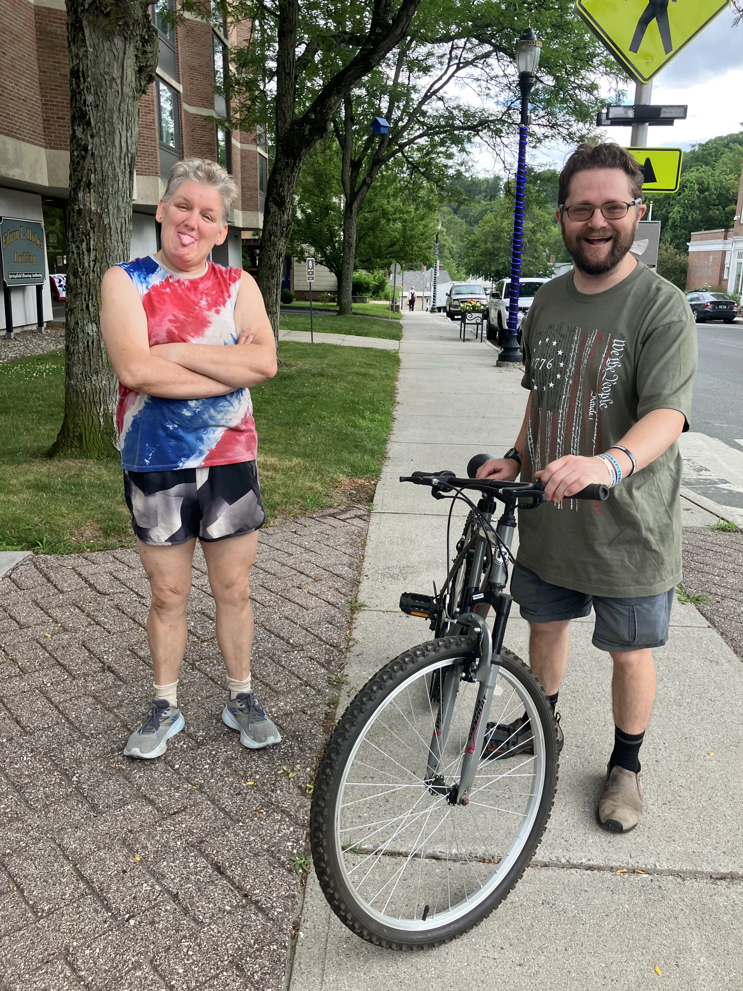 Happy customers with their new bike