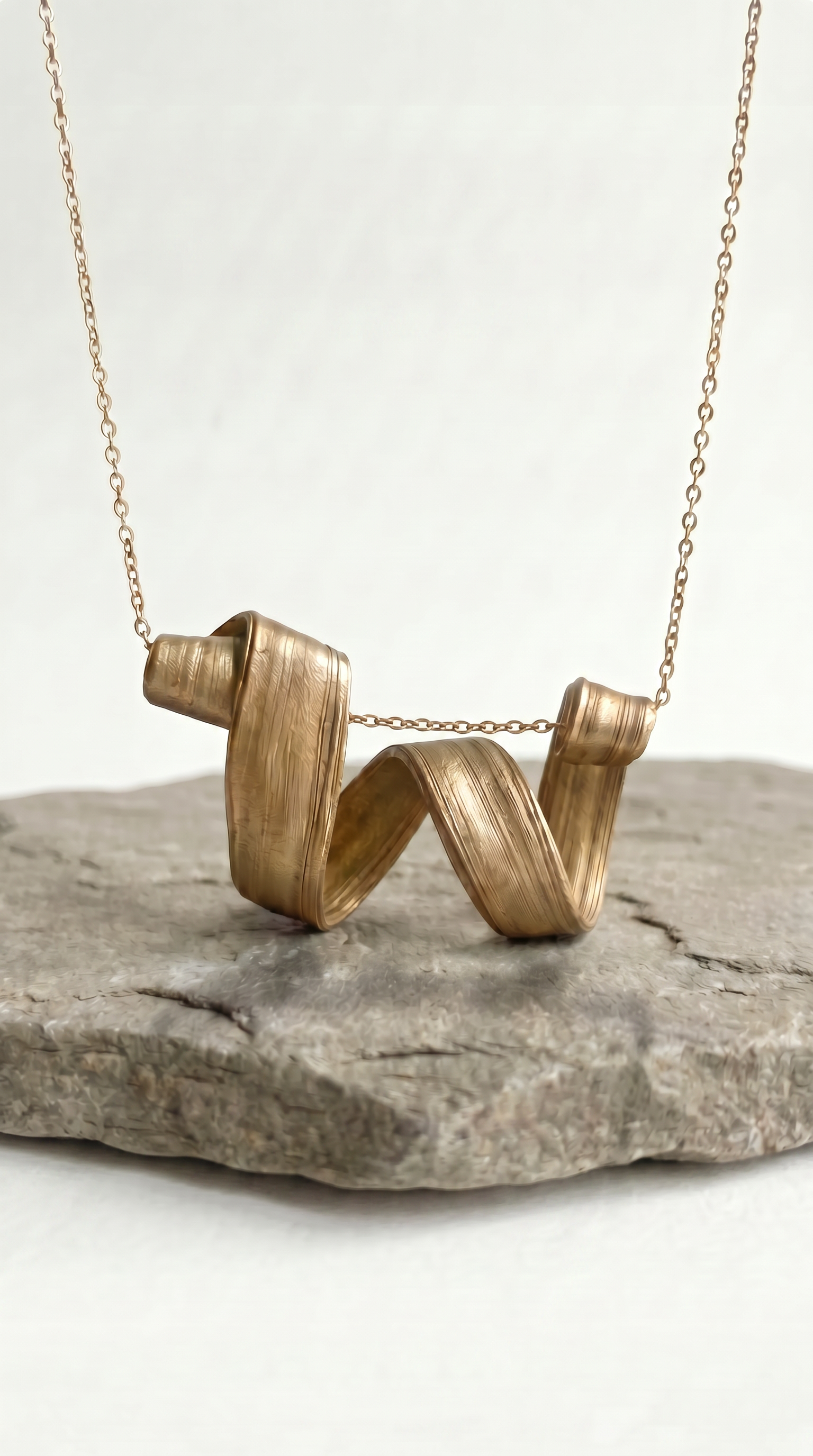 Folded Pendant in Bronze