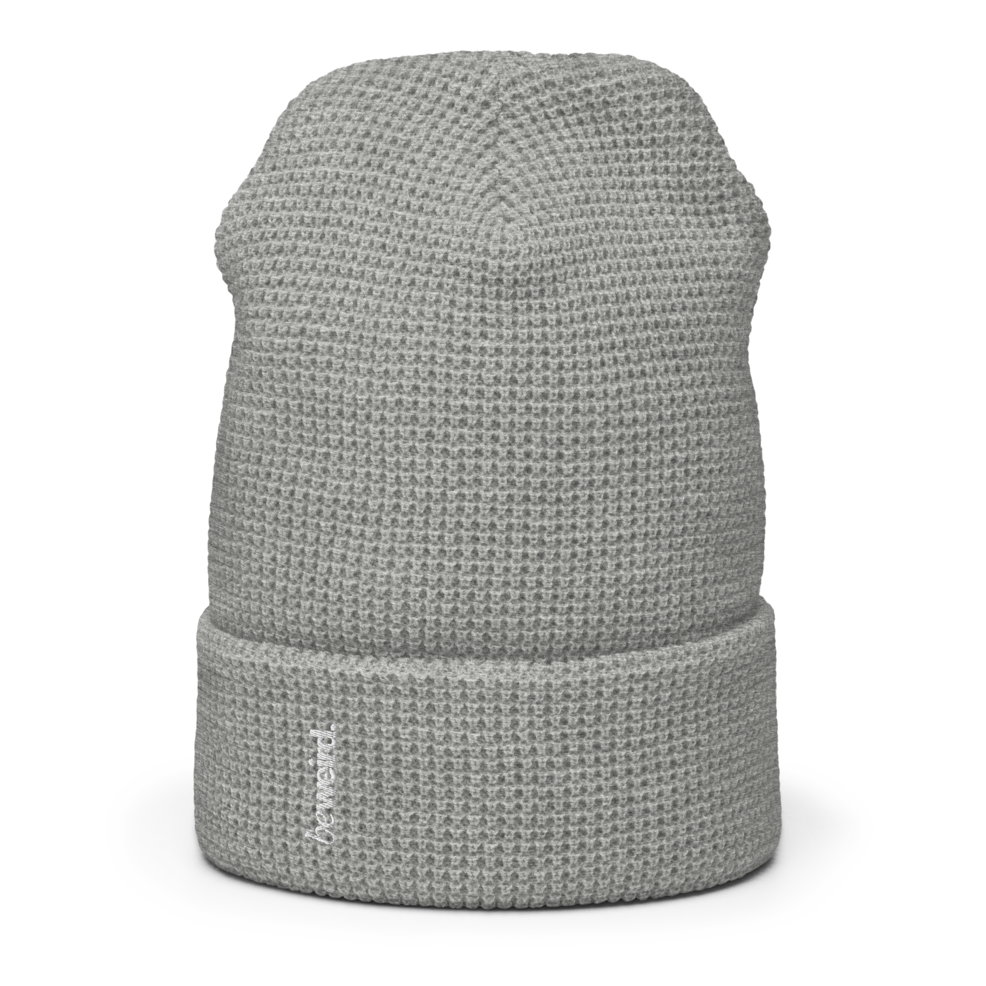 The Beanie - Grey Waffle Knit Beanie. Features a small vertical label on the cuff reading 'beweird.'.