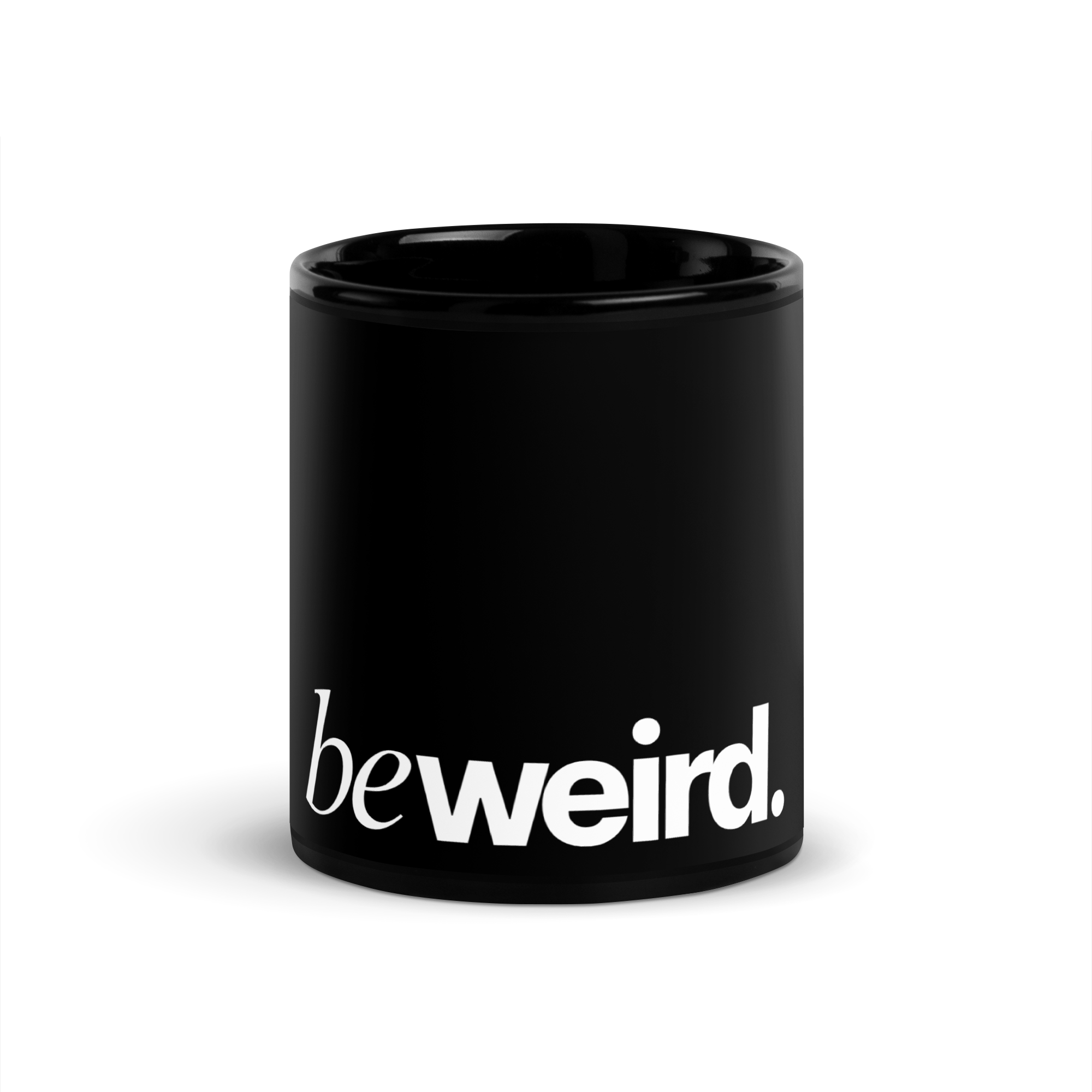 The Mug - beweird.' Black Mug. Features the slogan in white serif typography against a matte black finish.