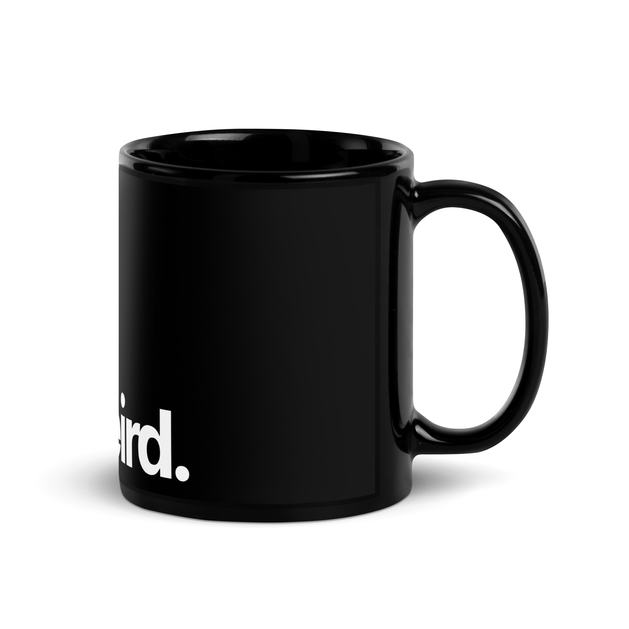 The Mug - Black Mug, side view. Shows the handle and partial white text ending in 'rd.'.