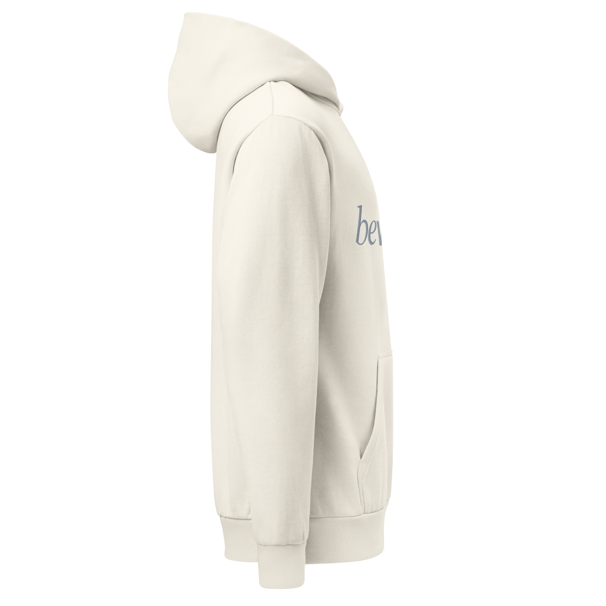 Hoodie Number One - Cream pullover hoodie, angled side view. Shows the drop-shoulder silhouette and kangaroo pocket profile.