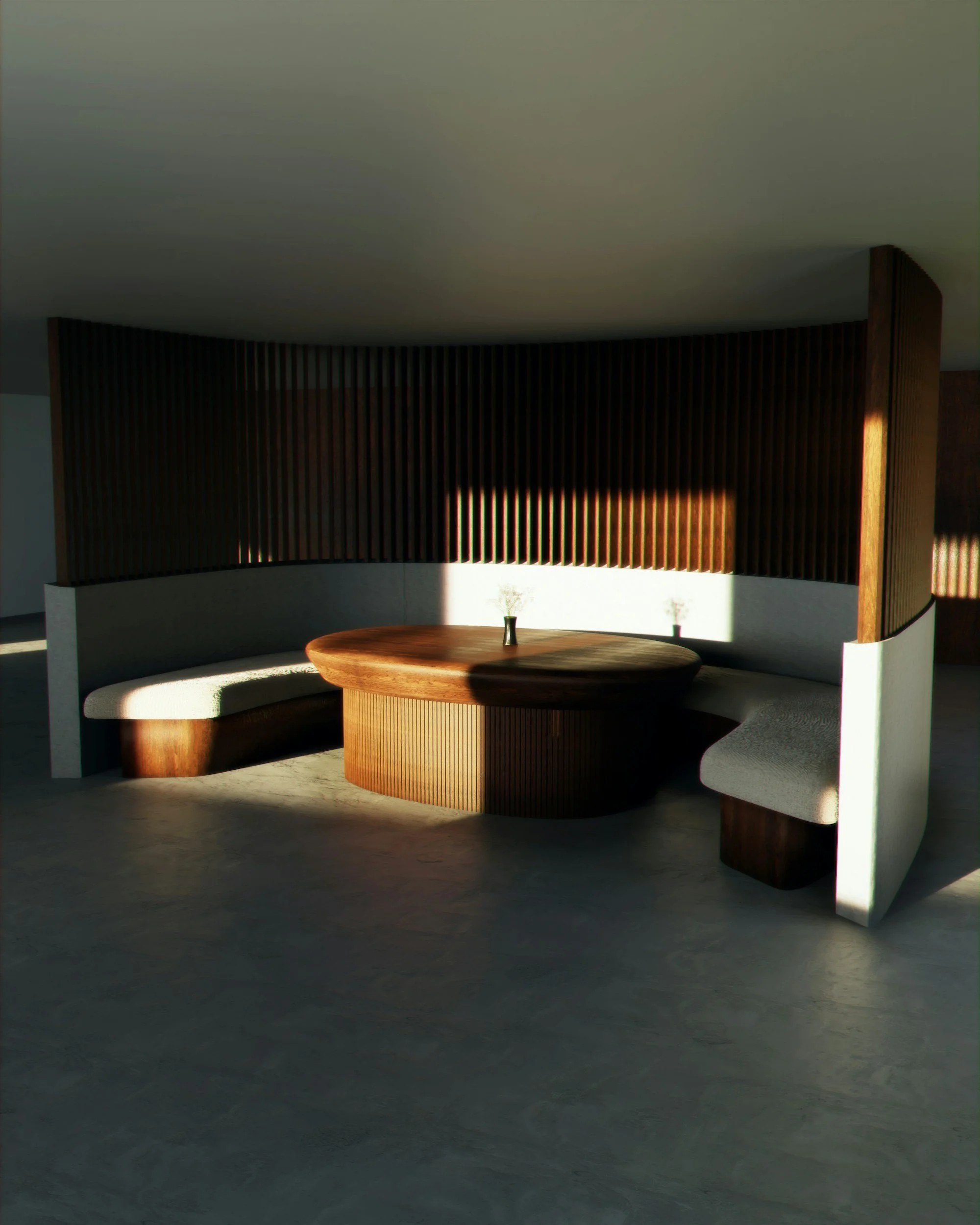 Modern interior with round wooden table, curved built-in seating with gray upholstery, and a black slatted partition with sunlight creating shadows on the floor.