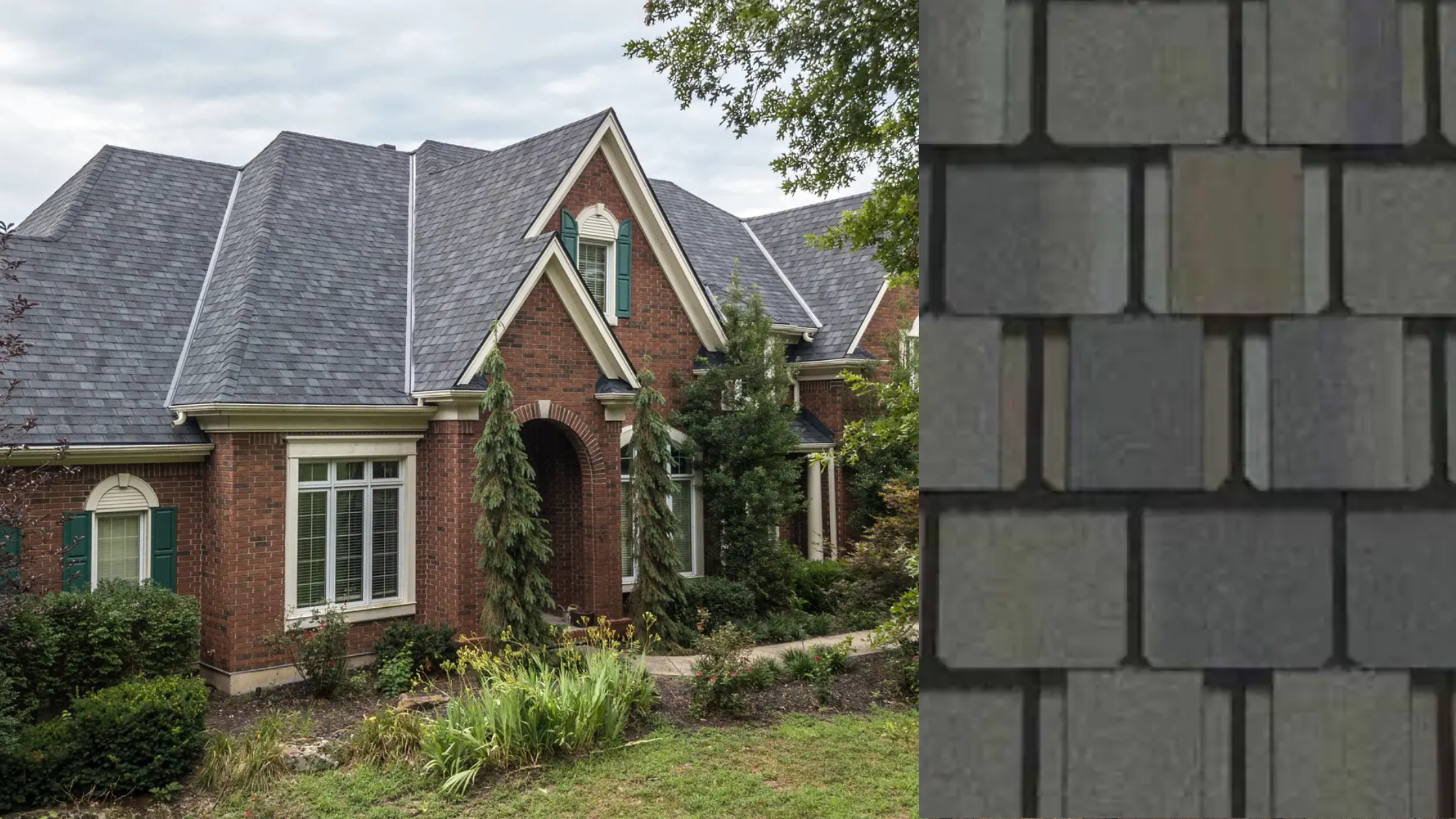 A two-story brick house with a gray shingled roof, white window frames, and green shutters, surrounded by trees and landscaped garden.