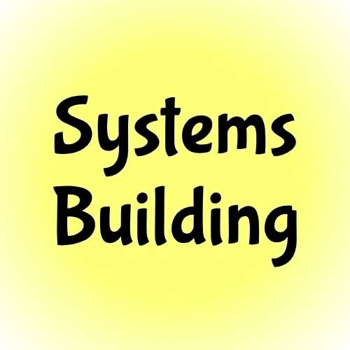 Yellow circle with black text that reads, "Systems Building"
