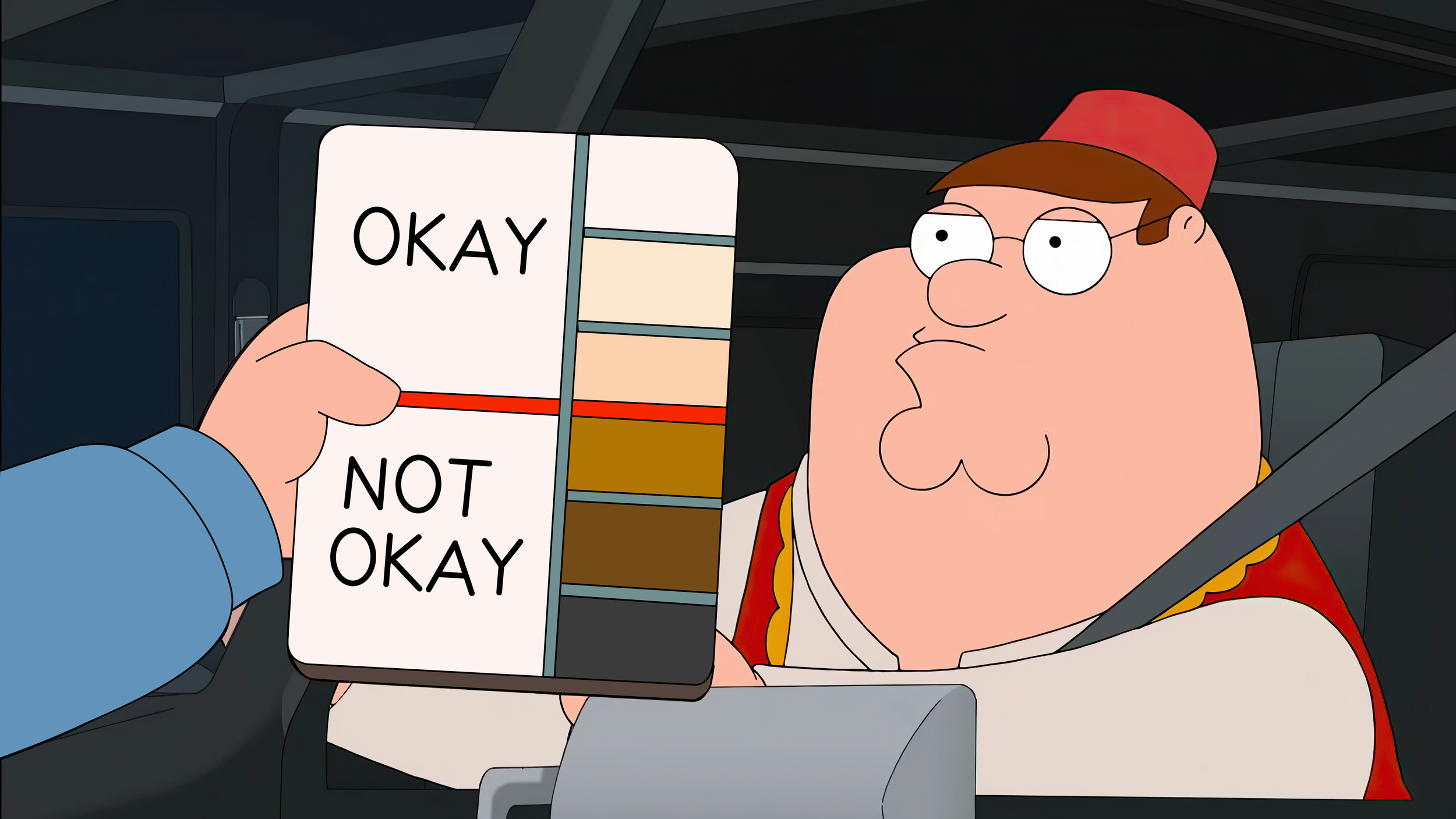 Meme of Peter Griffin wearing a Fez hat, sitting in a car staring straight ahead. A hand is jutting out in front of him, holding up a sign that reads “OKAY” and “NOT OKAY” next to a set of colors going from white to black.