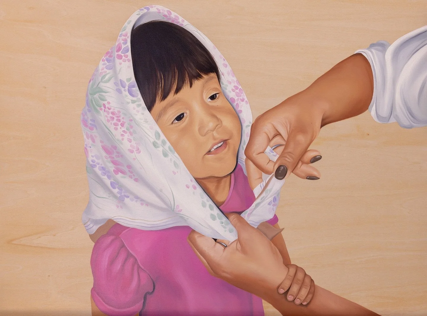 A fond memory in my home was when my mom and aunties would wrap a scarf around our heads and tie it under our chins, just like our Nal&iacute;s and Masan&iacute;s. We would waddle around to everyone gathered in that room and extend our little hands f