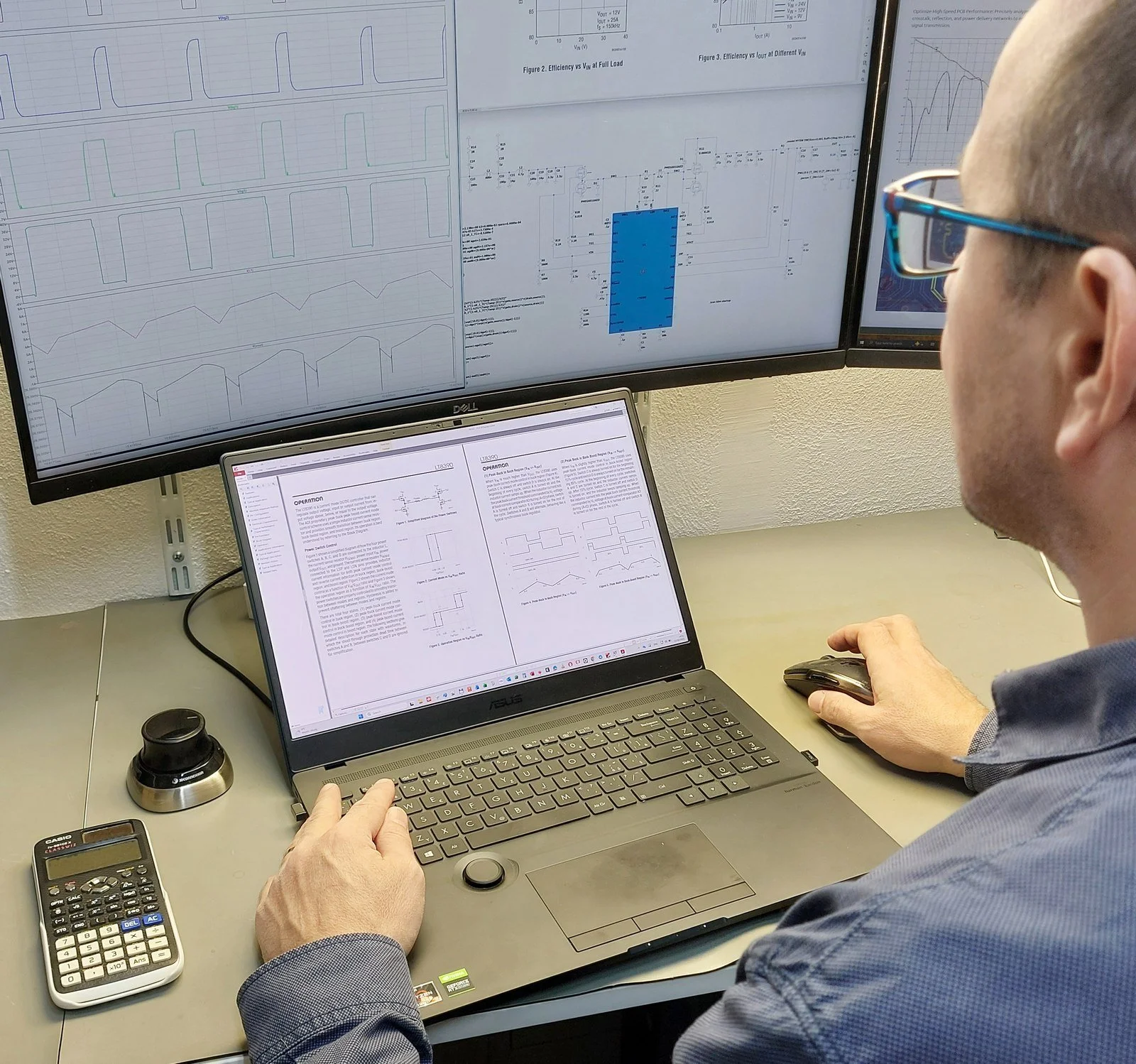 Electronic engineer simulate with LTspice tool with laptop and external monitor