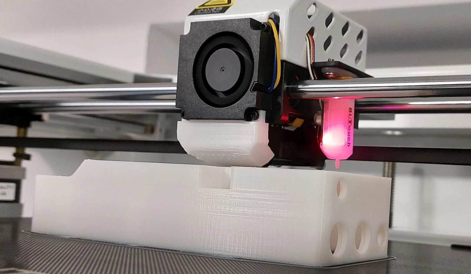 3D printer head printing product enclosure