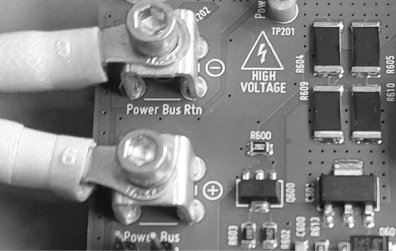 High-voltage pictogram on the power electronic board with high-current sockets